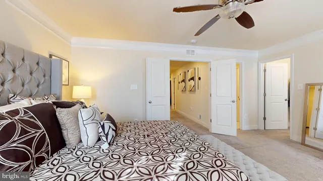 a bathroom with a granite countertop sink a mirror and shower