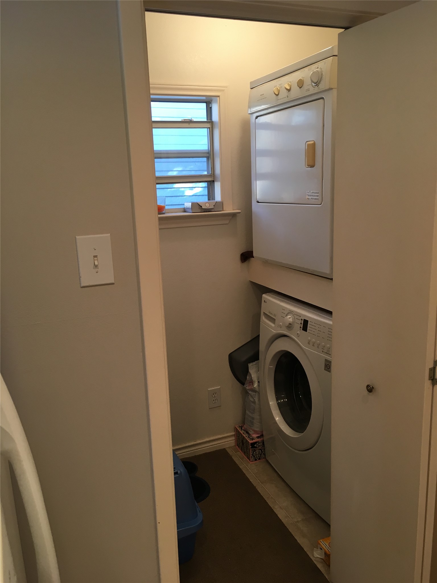 2639 West 45th Street Austin, TX 78731 - Photo 18 of 29 Laundry area featuring stacked washer and clothes dryer