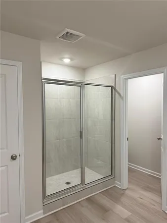 a bathroom with a sink and mirror