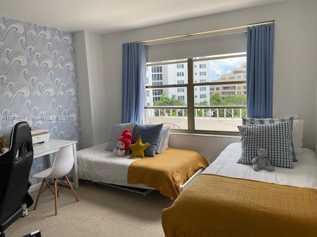 199 Ocean Ln Drive, Unit 707 Key Biscayne, FL 33149 - Photo 13 of 24 a bedroom with two beds and a window