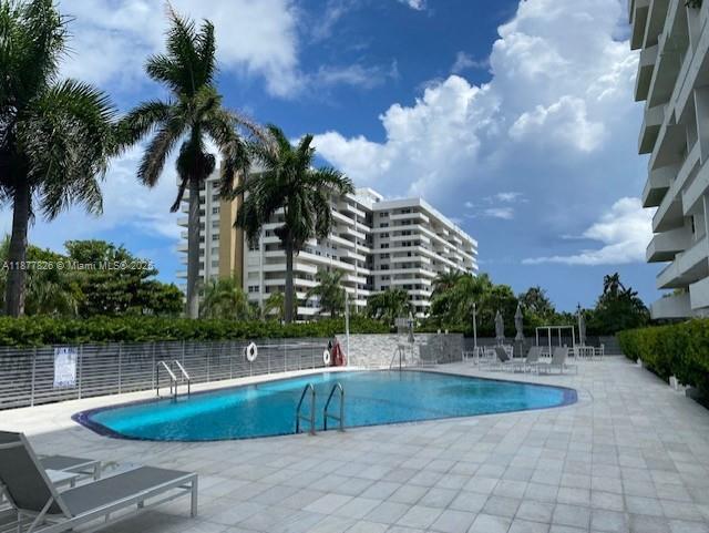 199 Ocean Ln Drive, Unit 707 Key Biscayne, FL 33149 - Photo 19 of 24 a view of swimming pool with a yard