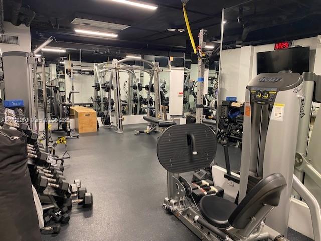 199 Ocean Ln Drive, Unit 707 Key Biscayne, FL 33149 - Photo 23 of 24 a room with gym equipment