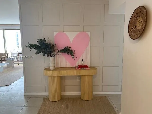 a view of a house with a potted plant