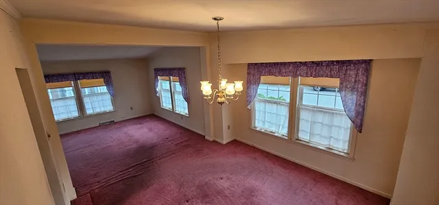 a view of a room with a window