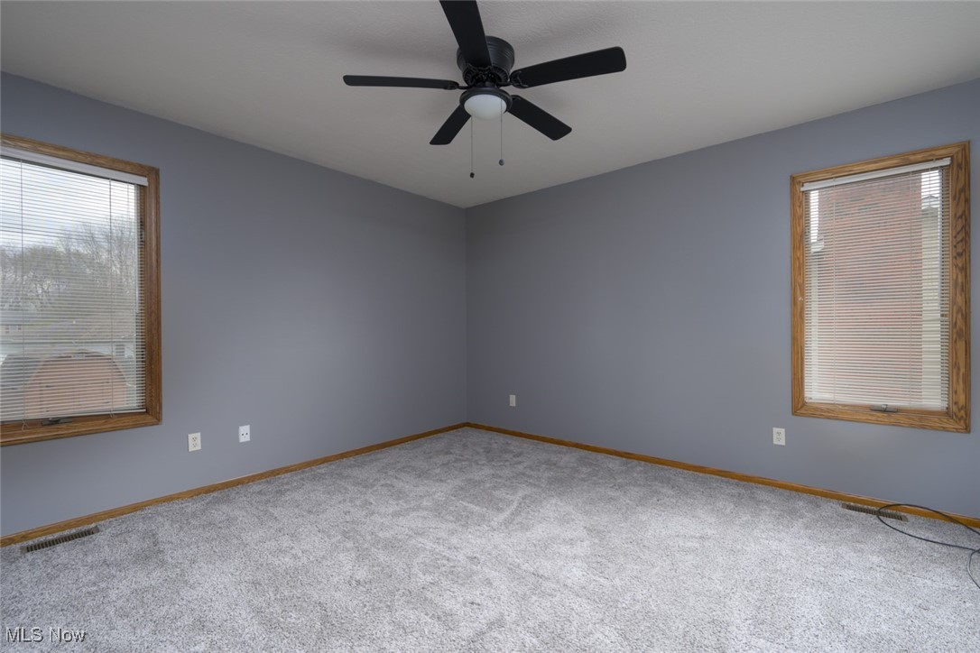 819 Bridge Road Akron, OH 44312 - Photo 27 of 33 Carpeted bedroom with ceiling fan