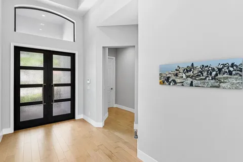a view of a room with a large window