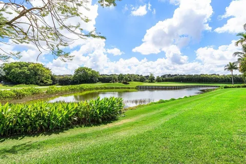 a view of a lake with a big yard