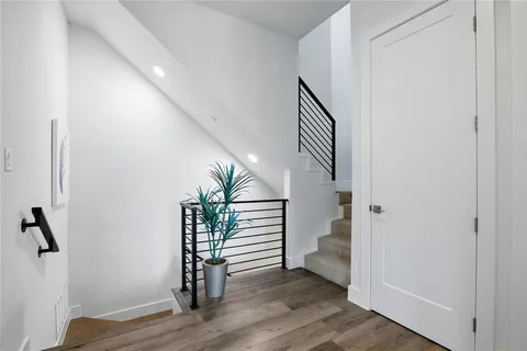 a view of entryway with wooden floor