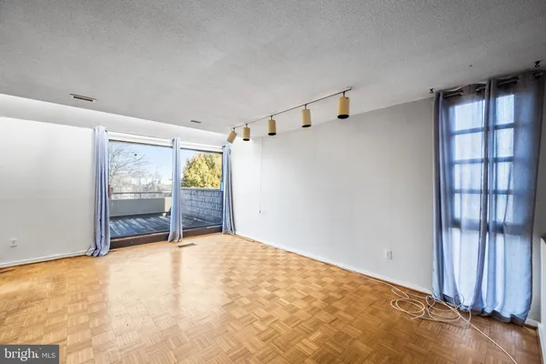 an empty room with windows