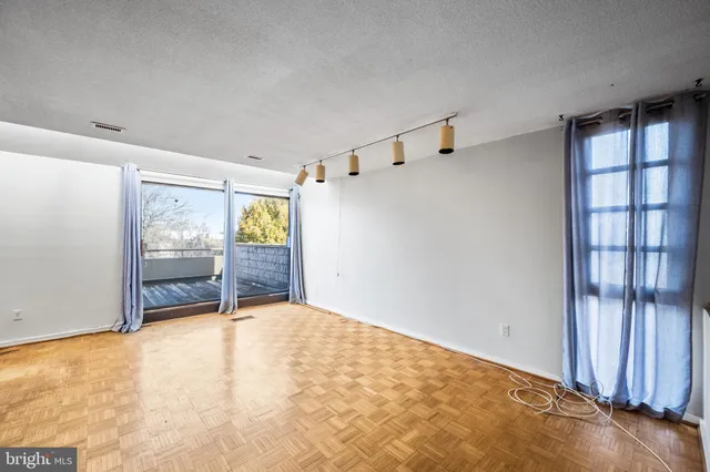 an empty room with windows