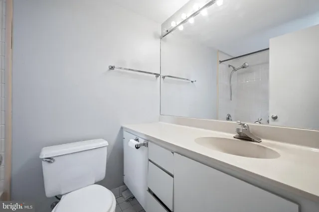 a view of a room that has a large window