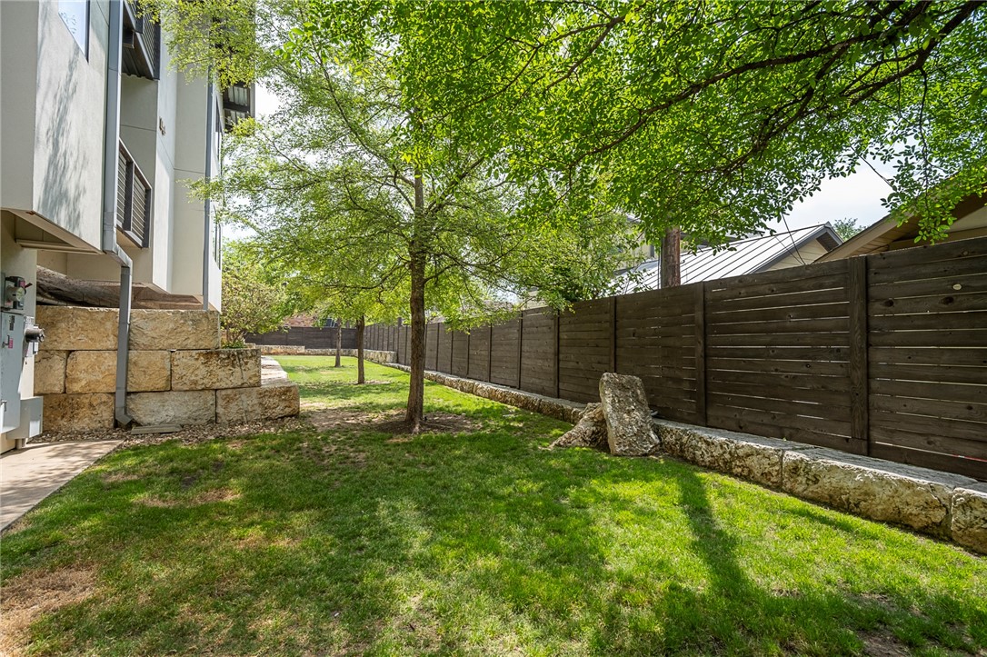 1603 Enfield Road, Unit 306 Austin, TX 78703 - Photo 11 of 16 Shaded Green Space Surrounds the property with a nice area to "park" your Dog, too.