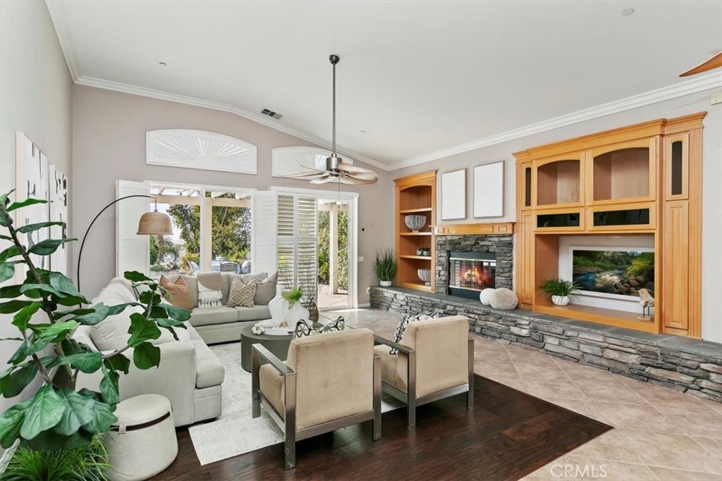 1486 Valley Drive Norco, CA 92860 - Photo 21 of 66 a living room with fireplace furniture and a large window