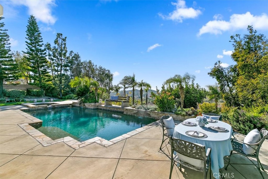 1486 Valley Drive Norco, CA 92860 - Photo 36 of 66 a view of a lake with a patio