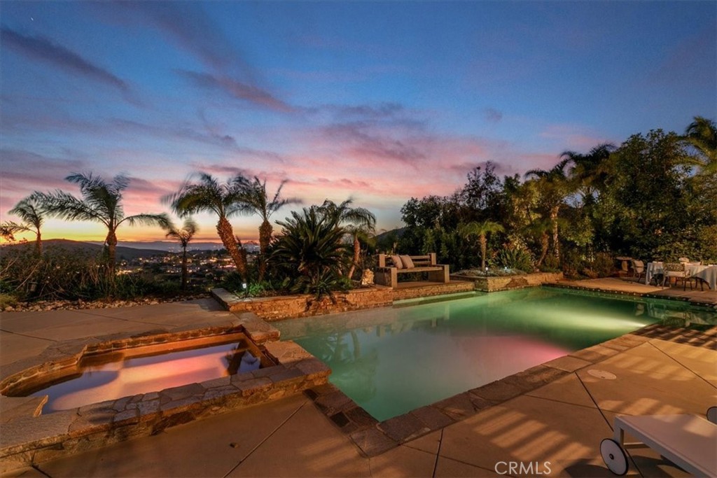 1486 Valley Drive Norco, CA 92860 - Photo 42 of 66 a view of a swimming pool and lounge chairs