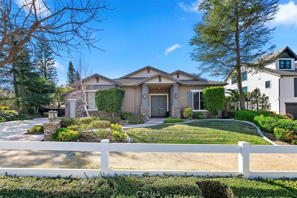 1486 Valley Drive Norco, CA 92860 - Photo 5 of 66 a front view of a house with garden