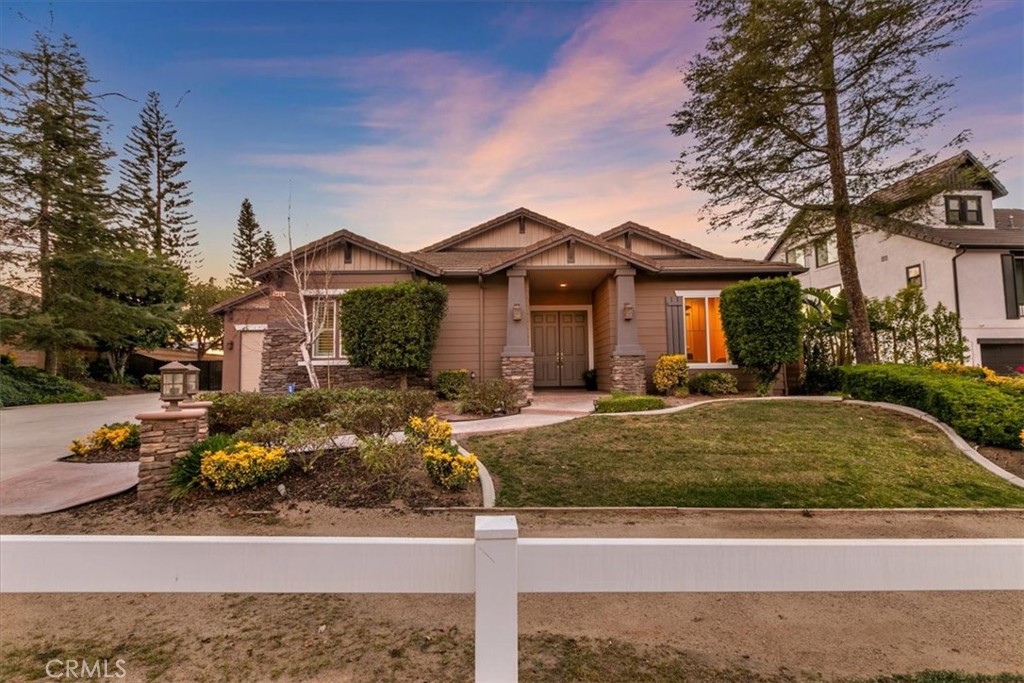 1486 Valley Drive Norco, CA 92860 - Photo 6 of 66 a front view of a house with garden