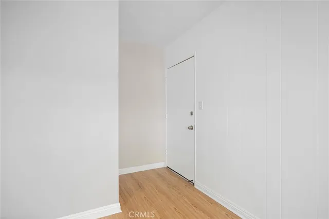 a view of small space with wooden floor