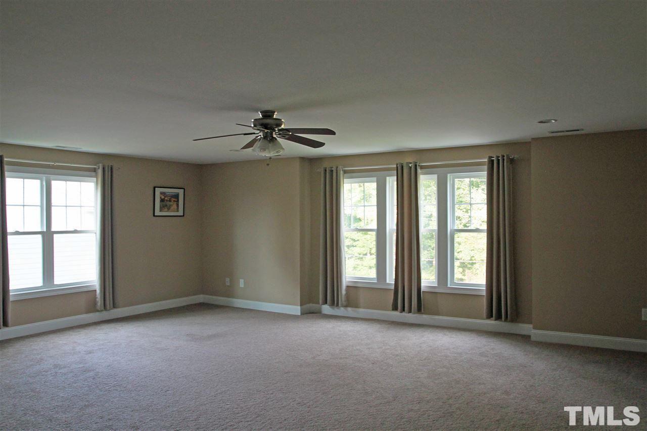 5312 Olive Road Raleigh, NC 27606 - Photo 5 of 5 a view of empty room with windows
