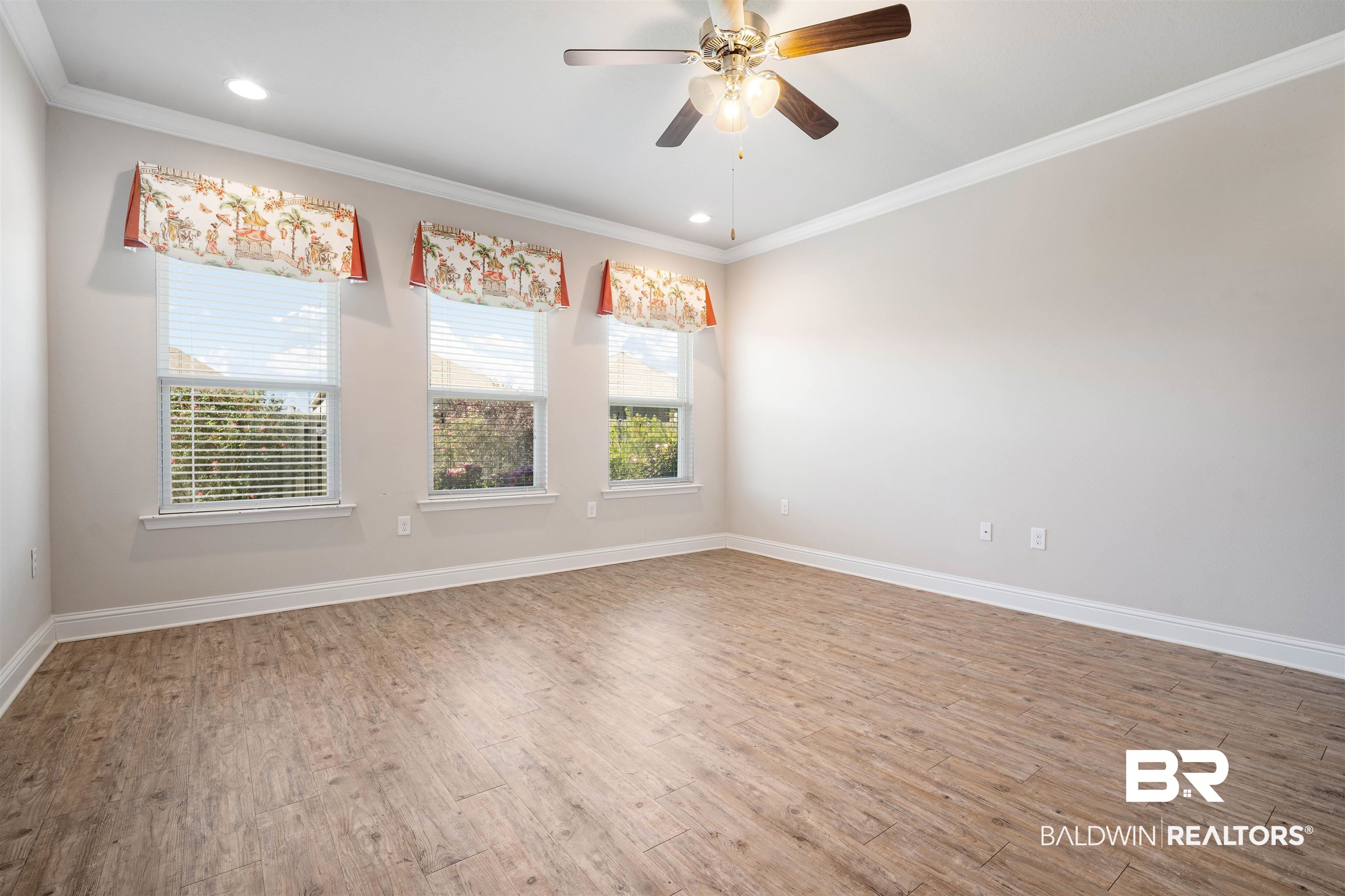 24479 Kipling Court Daphne, AL 36526 - Photo 5 of 41 Unfurnished room featuring crown molding, light wood-style flooring, recessed lighting, and ceiling fan