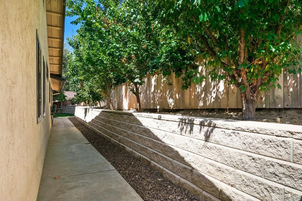 1005 Woodcreek Road Fallbrook, CA 92028 - Photo 30 of 32 a view of a yard with large trees