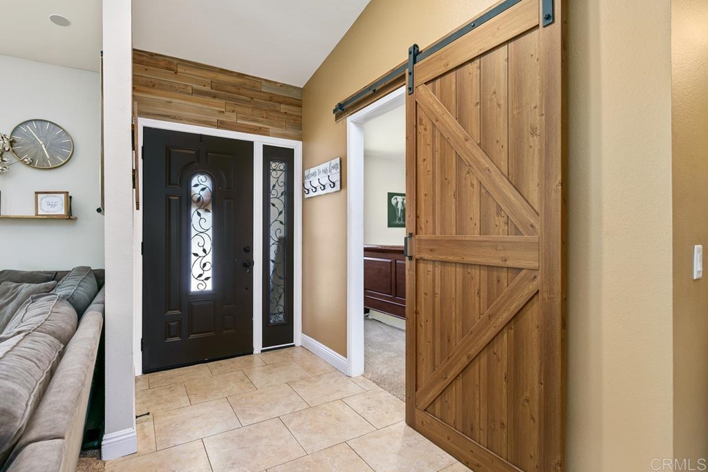1005 Woodcreek Road Fallbrook, CA 92028 - Photo 6 of 32 a view of livingroom with furniture and windows