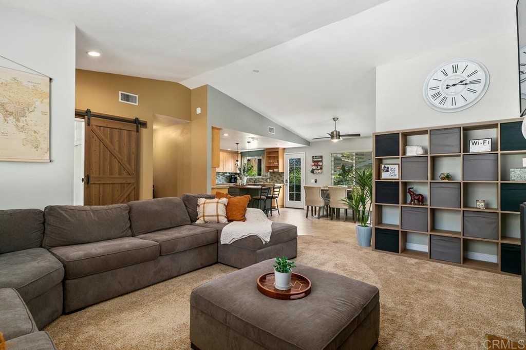 1005 Woodcreek Road Fallbrook, CA 92028 - Photo 8 of 32 a living room with furniture and a table