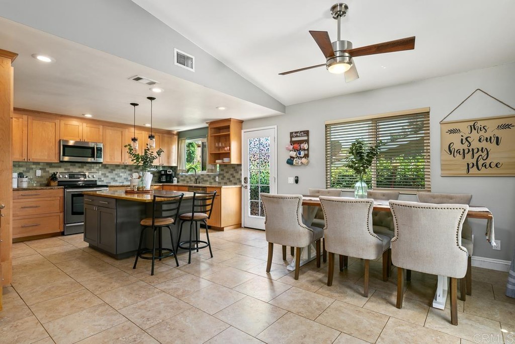 1005 Woodcreek Road Fallbrook, CA 92028 - Photo 10 of 32 a view of a dining room with furniture window and outside view