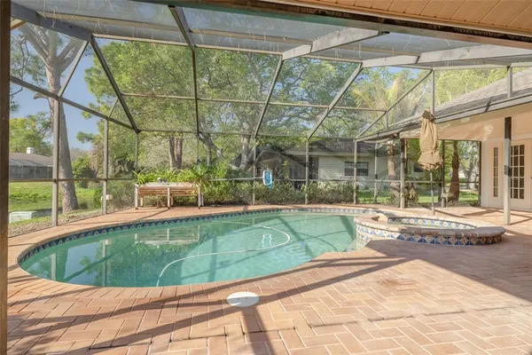 a view of a house with a swimming pool