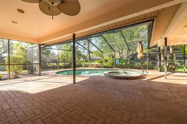 a view of yard with patio