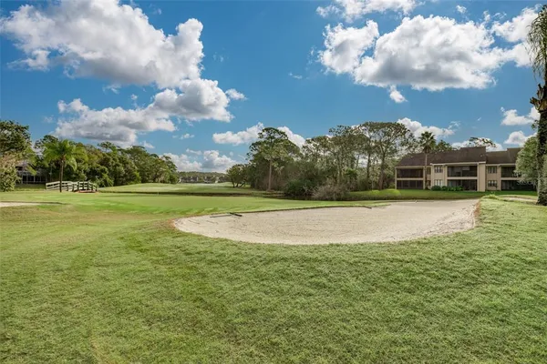 a view of a house with a big yard