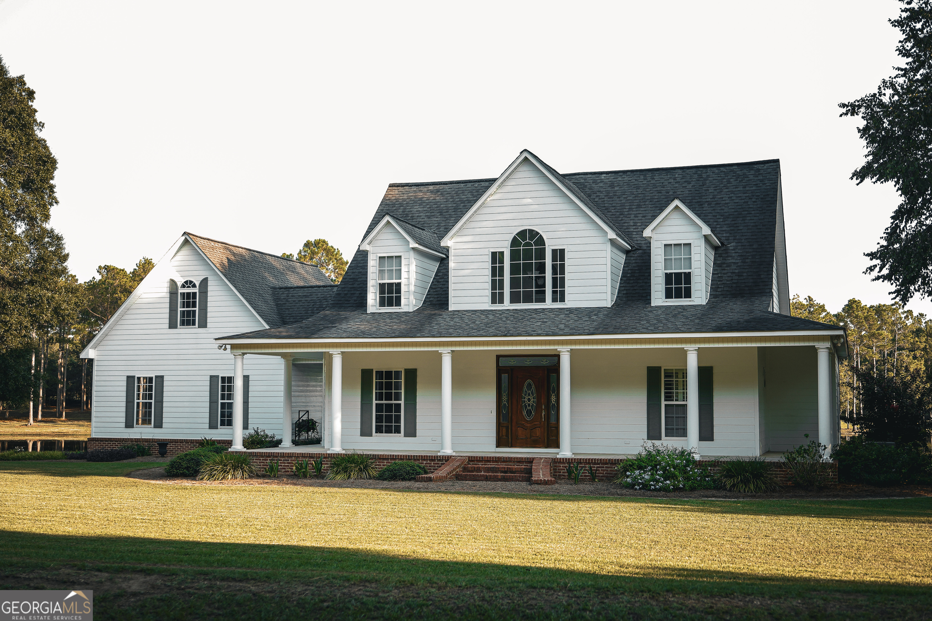 1576 Chula Brookfield Road Tifton, GA 31794 - Photo 26 of 79 a front view of a house with yard and green space