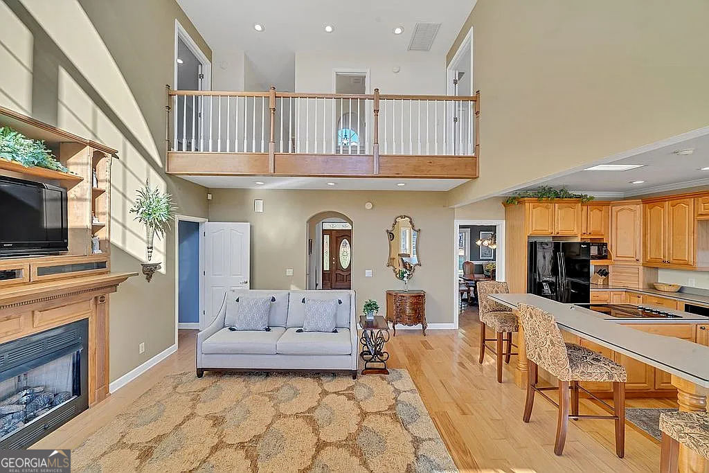 1576 Chula Brookfield Road Tifton, GA 31794 - Photo 69 of 79 a living room with fireplace furniture and a flat screen tv