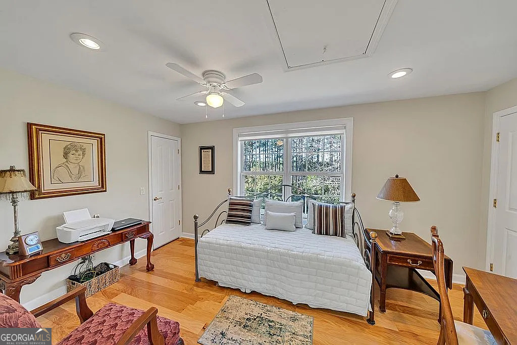 1576 Chula Brookfield Road Tifton, GA 31794 - Photo 77 of 79 a bedroom with furniture and a window
