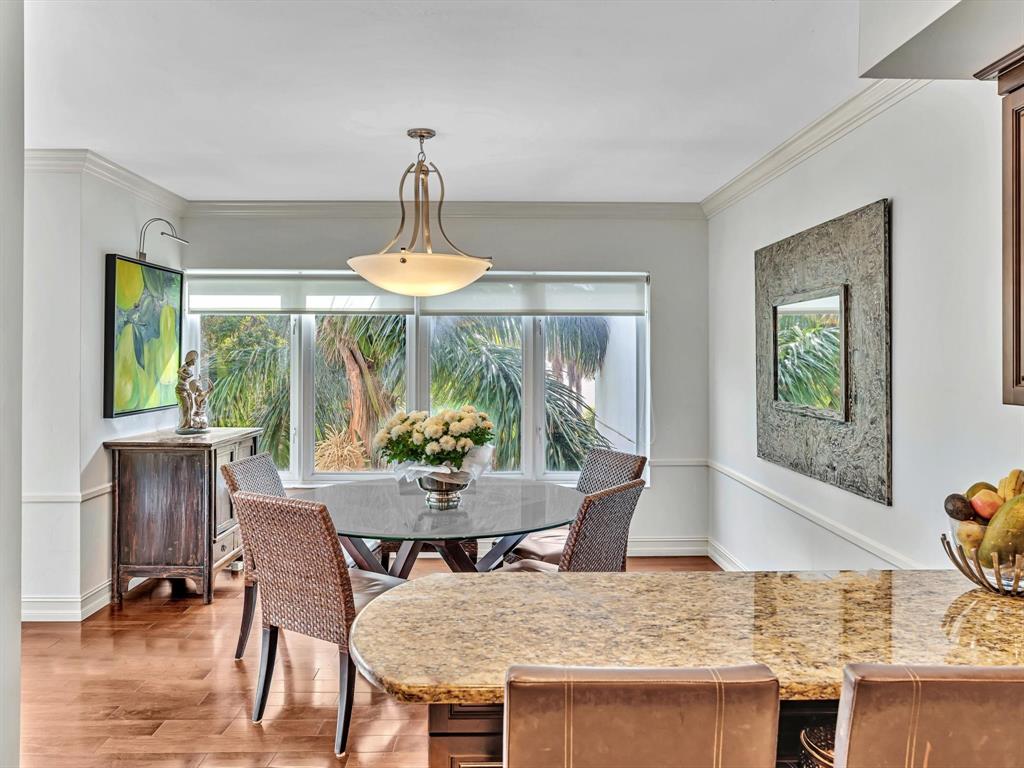 701 East Camino Real, Unit 4E Boca Raton, FL 33432 - Photo 21 of 45 a view of a dining room with furniture window and outside view