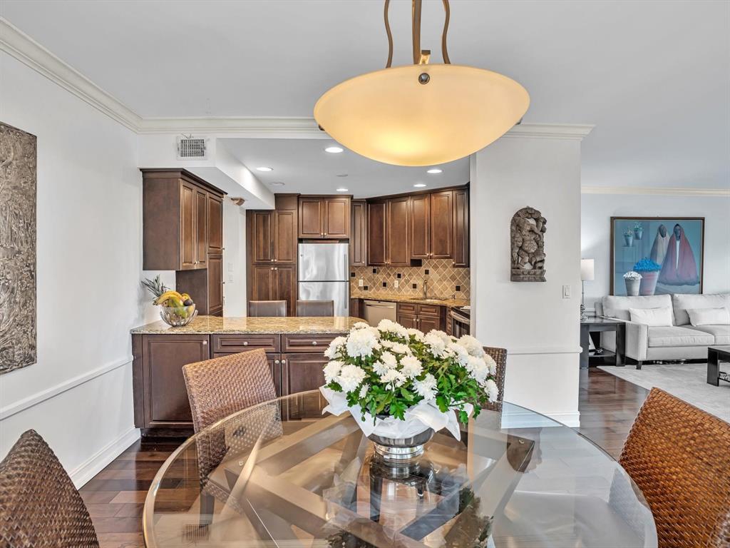 701 East Camino Real, Unit 4E Boca Raton, FL 33432 - Photo 22 of 45 a view of a dining room with furniture