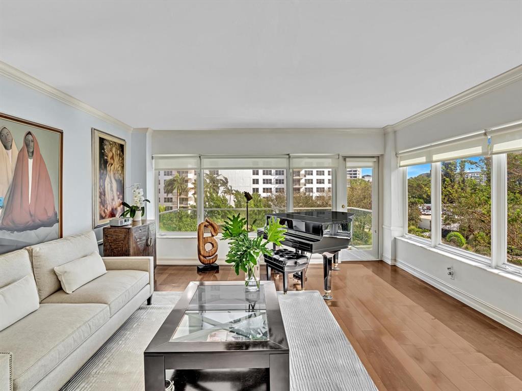 701 East Camino Real, Unit 4E Boca Raton, FL 33432 - Photo 30 of 45 a living room with furniture and a large window