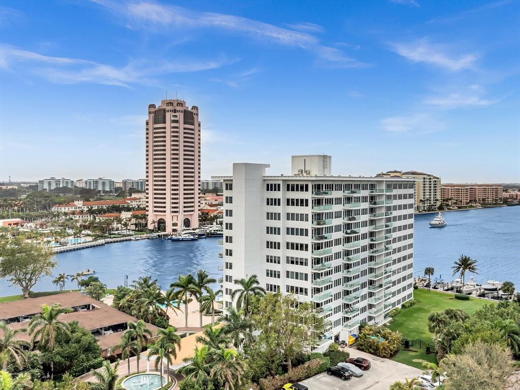 701 East Camino Real, Unit 4E Boca Raton, FL 33432 - Photo 45 of 45 a front view of a building with a garden