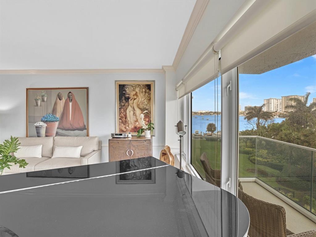 701 East Camino Real, Unit 4E Boca Raton, FL 33432 - Photo 8 of 45 a view of a living room hardwood and a balcony