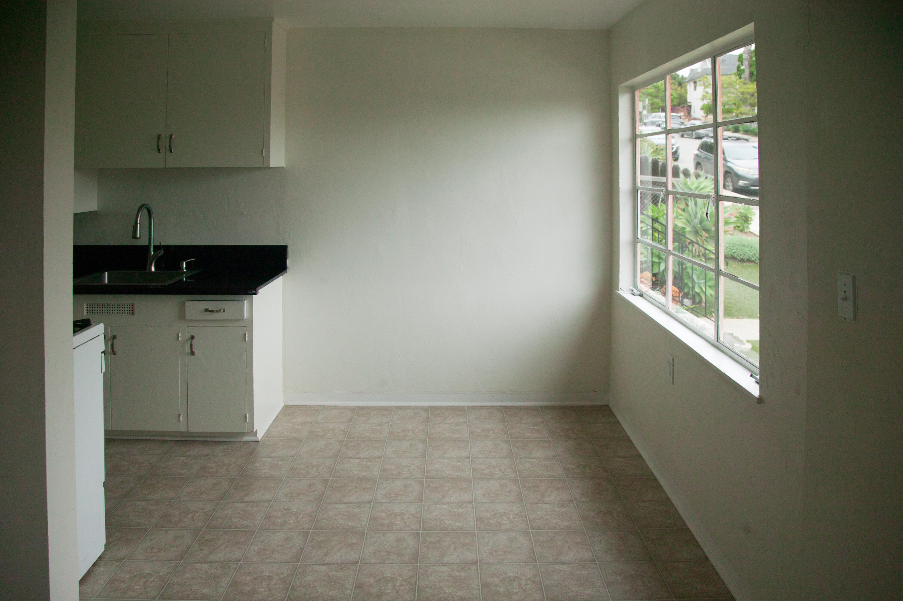 815 East Figueroa Street Santa Barbara, CA 93103 - Photo 4 of 17 an empty room with windows