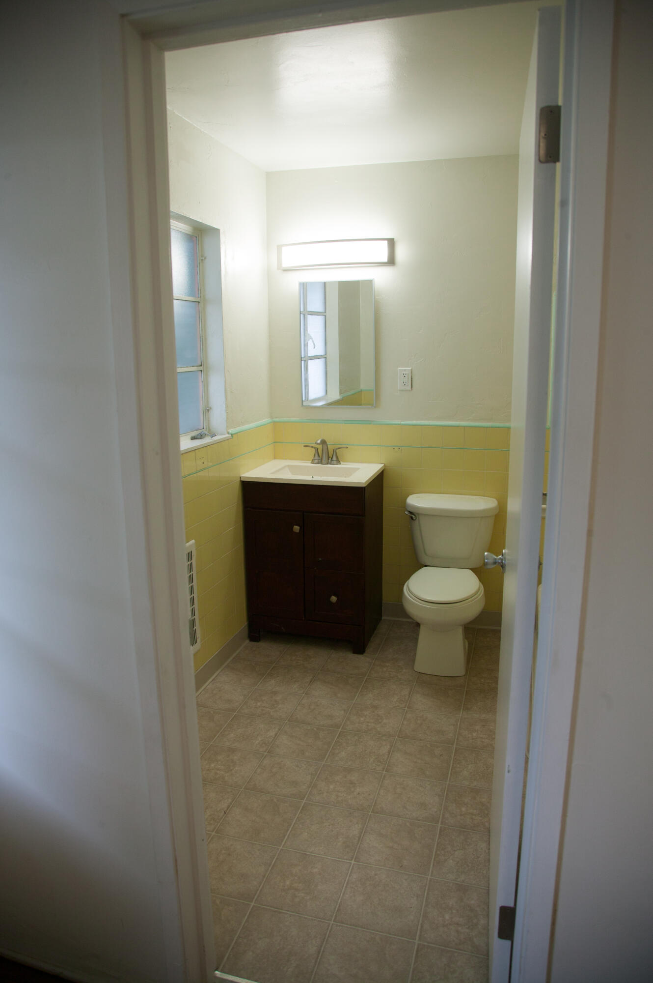 815 East Figueroa Street Santa Barbara, CA 93103 - Photo 9 of 17 a bathroom with a sink and a mirror