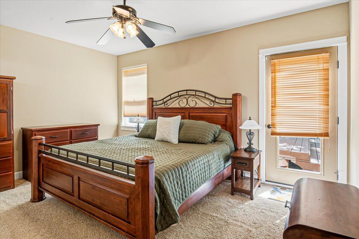 1339 Southwest Rimrock Way Redmond, OR 97756 - Photo 9 of 26 a bedroom with a bed and window