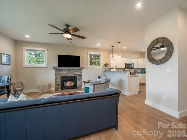 a living room with a couch and a fireplace