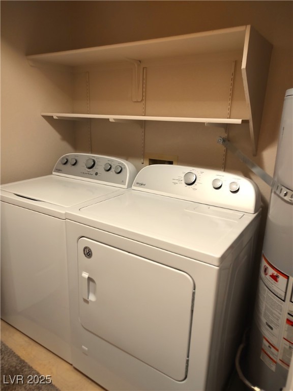 2223 Rugged Mesa Drive Laughlin, NV 89029 - Photo 13 of 28 Washroom with laundry area, water heater, and wash