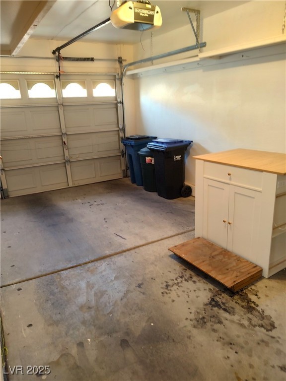 2223 Rugged Mesa Drive Laughlin, NV 89029 - Photo 25 of 28 Garage featuring a garage door opener