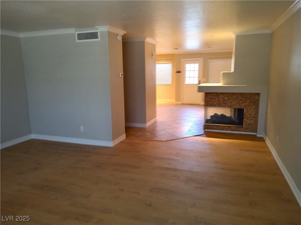 2223 Rugged Mesa Drive Laughlin, NV 89029 - Photo 3 of 28 Unfurnished living room with wood finished floors,