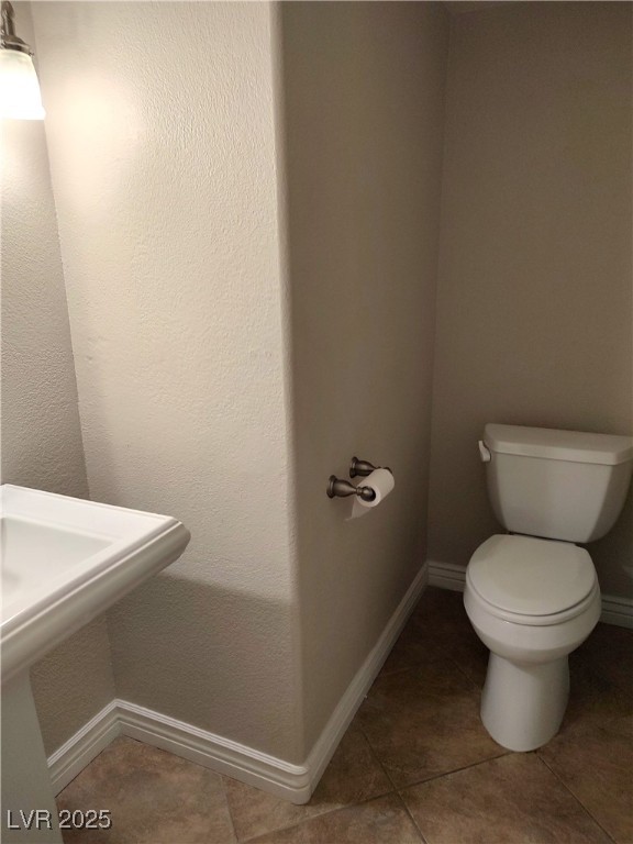 2223 Rugged Mesa Drive Laughlin, NV 89029 - Photo 5 of 28 Half bath with a sink, tile patterned flooring, to