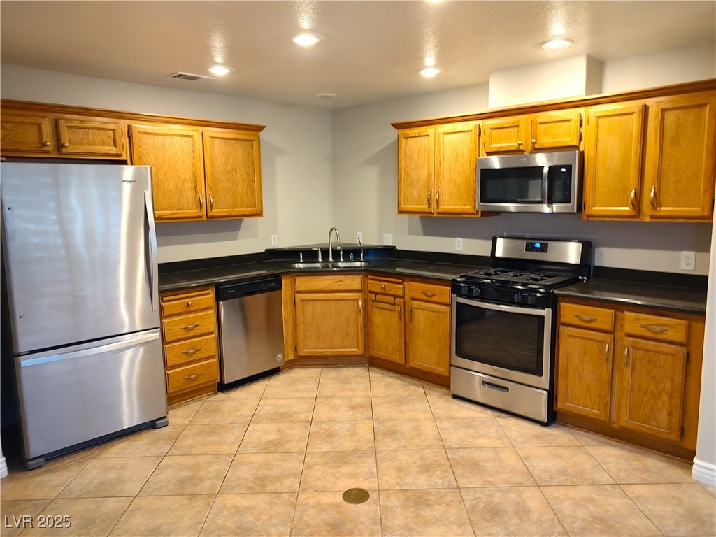 2223 Rugged Mesa Drive Laughlin, NV 89029 - Photo 6 of 28 Kitchen featuring stainless steel appliances, dark