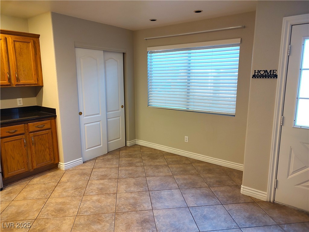 2223 Rugged Mesa Drive Laughlin, NV 89029 - Photo 10 of 28 Unfurnished dining area with light tile patterned