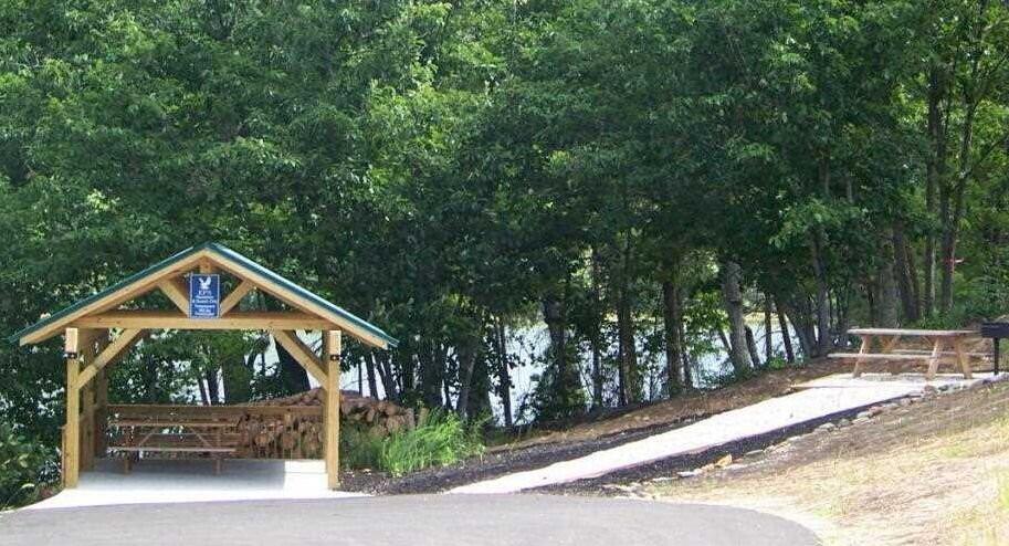 Lot 16 Robin Ridge Court Pittsville, VA 24139 - Photo 4 of 7 a front view of a house with garden